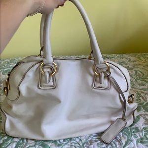 White leather handbag